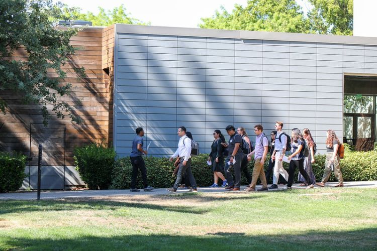 Law students go on a walking tour of campus.