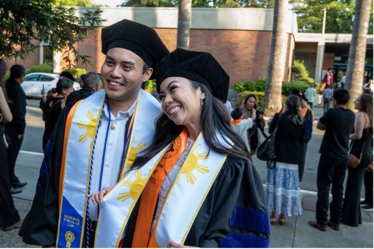 Darrin Baluyot ’23 and Janize Sarmiento ’23 celebrate their graduation at McGeorge School of Law’s Annual Unity Graduation in 2023.