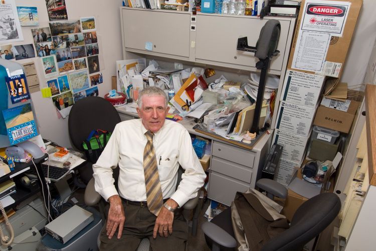 Richard Rutter sits inside his office