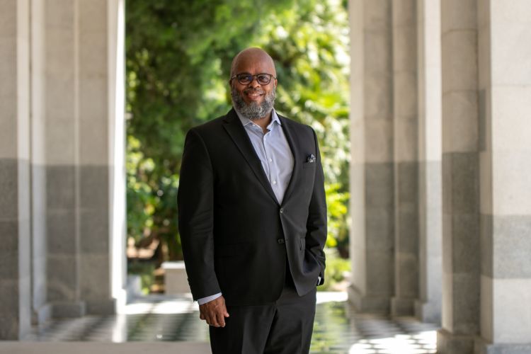 A portrait of a man wearing a suit