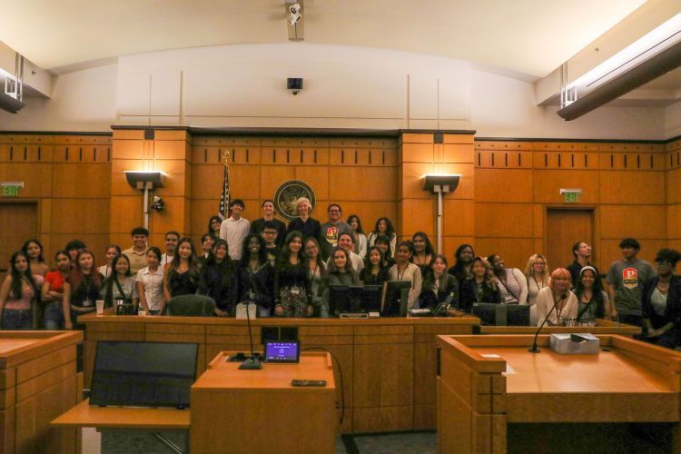 A large group of people in a courtroom