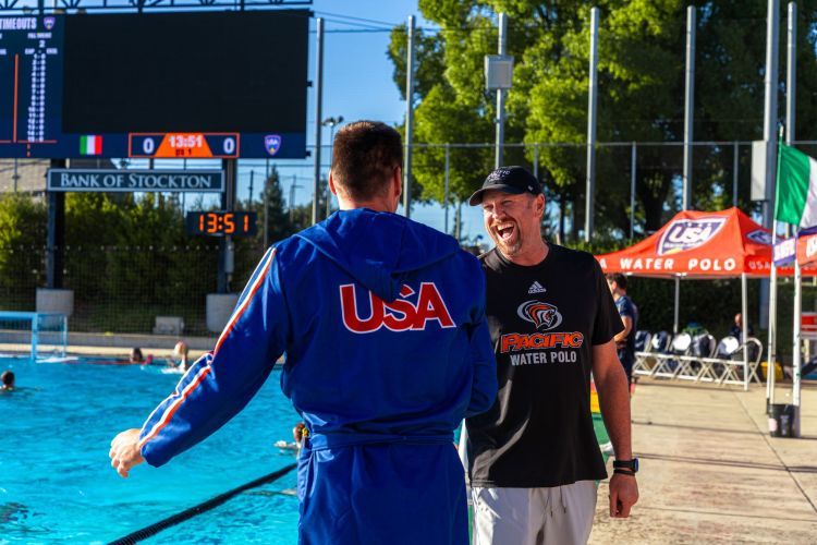 Alex Obert handshake with coach