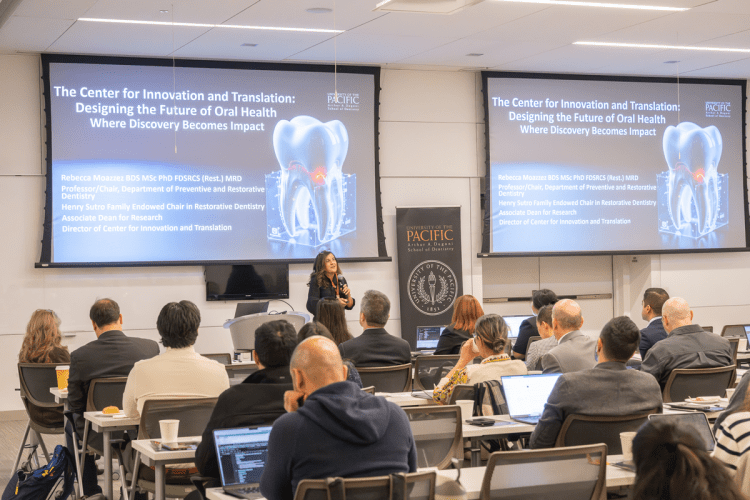 Rebecca Moazzez speaks at the AI symposium