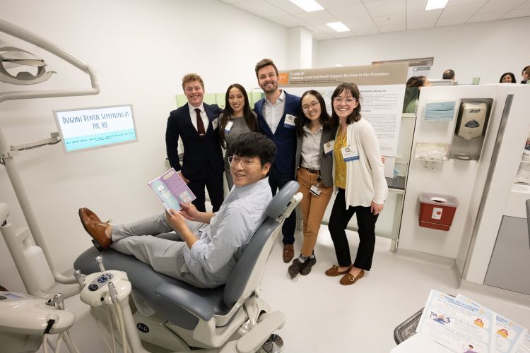 group posing in the clinic