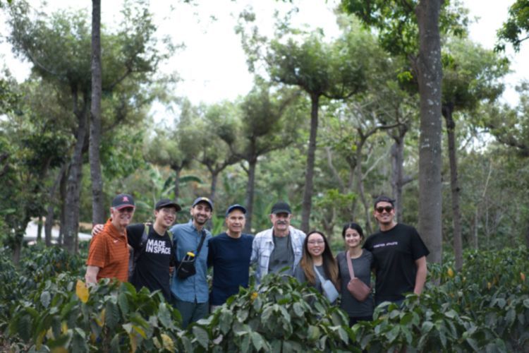 Group standing in forest