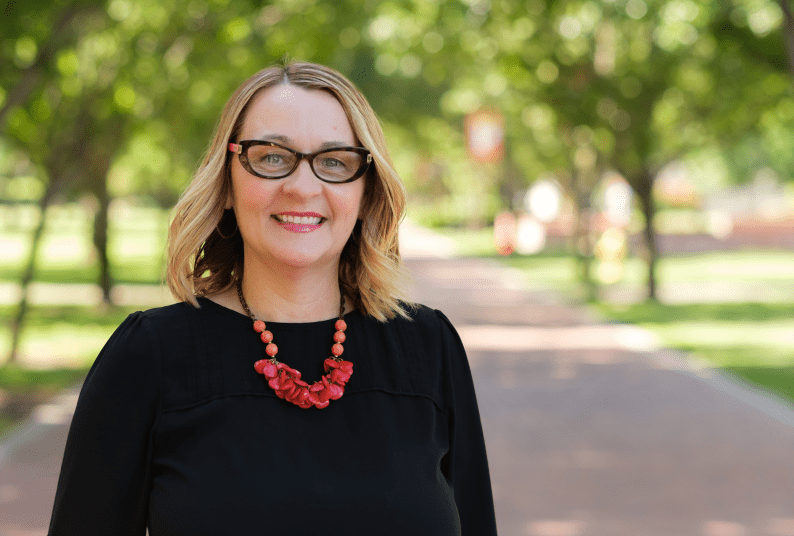 Jennifer Juanitas, OLLI Program Director, on the Stockton campus.