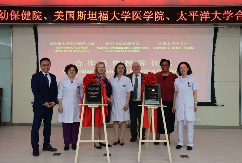 Associate Professor Jiong Hu (left) and Associate Professor Gabriella Musacchia (third from left) traveled to Nanjing University’s Women and Children Healthcare Hospital in China to renew their collaboration.