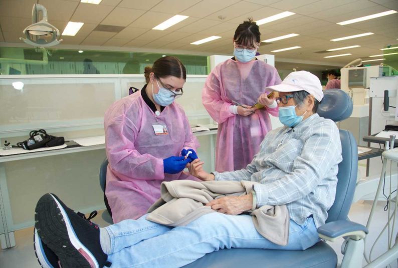 patient in chair at Senior Smiles