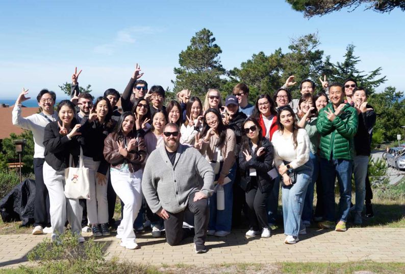 Asilomar Weekend attendees pose on the beach