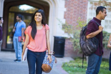 students walk on campus