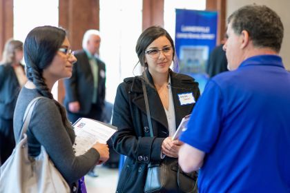 Photo of students at a career fair. 