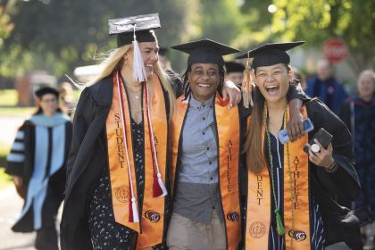 Pacific graduates attend a commencement ceremony