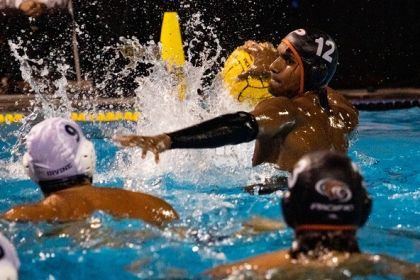 water polo players compete in a game