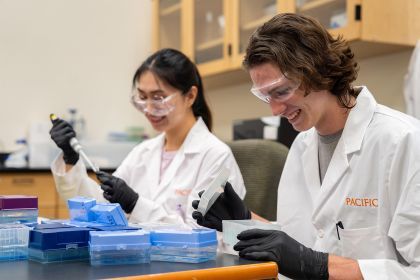 pharmacy students work in a lab