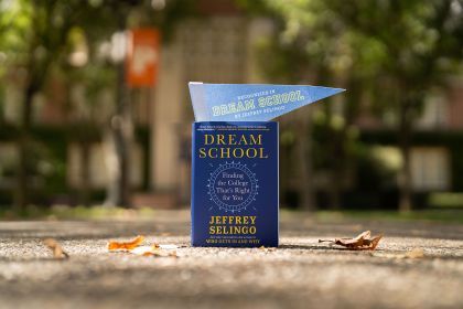 A blue book titled "Dream School" 