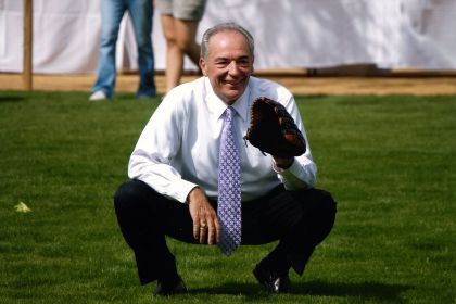 Don DeRosa holds baseball mitt