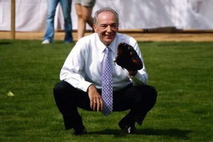 Don DeRosa holds baseball mitt