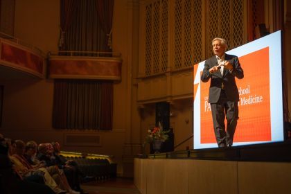 President Callahan on Faye Spanos stage