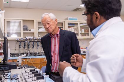Norman Kobayashi ’70, ’73 with graduate student in research lab