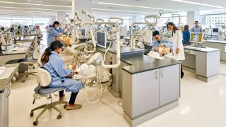 students working in a dental lab