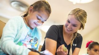 student with child patient