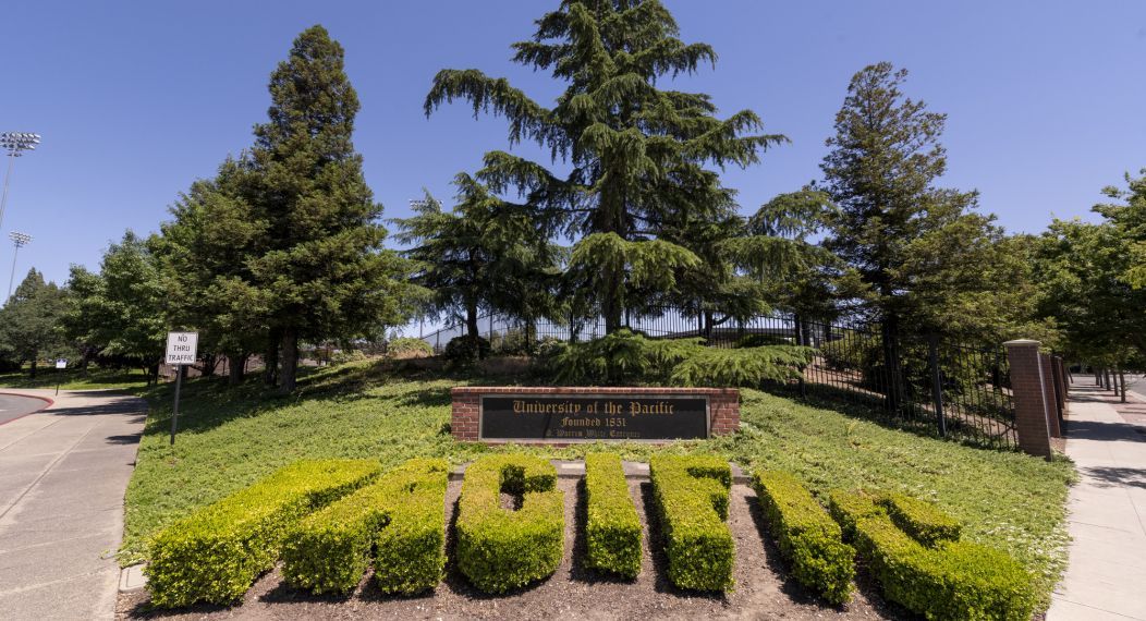 Pacific spelled in greenery on campus entrance