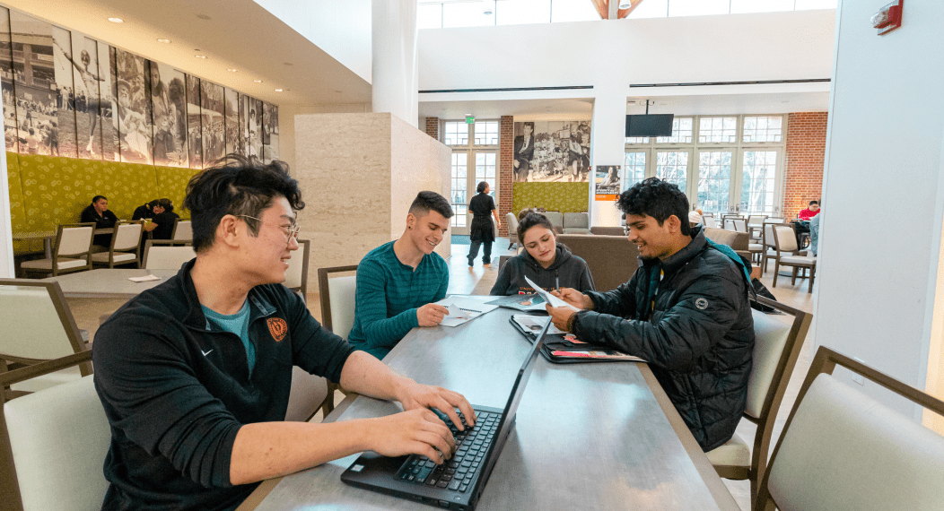 Group of students working on their research