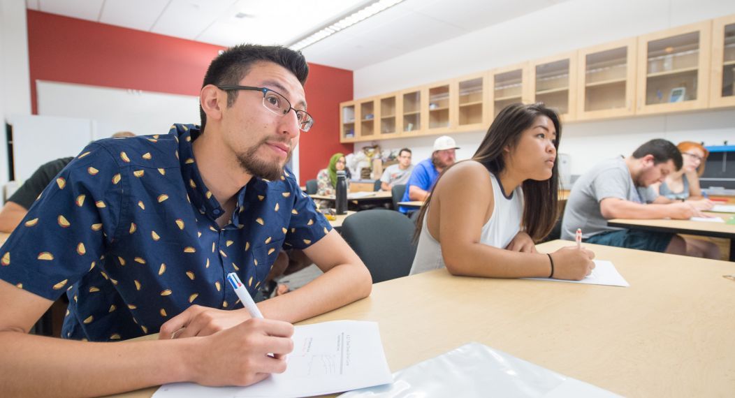 students take notes during class