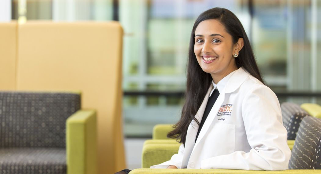 Audiology student sitting in lobby