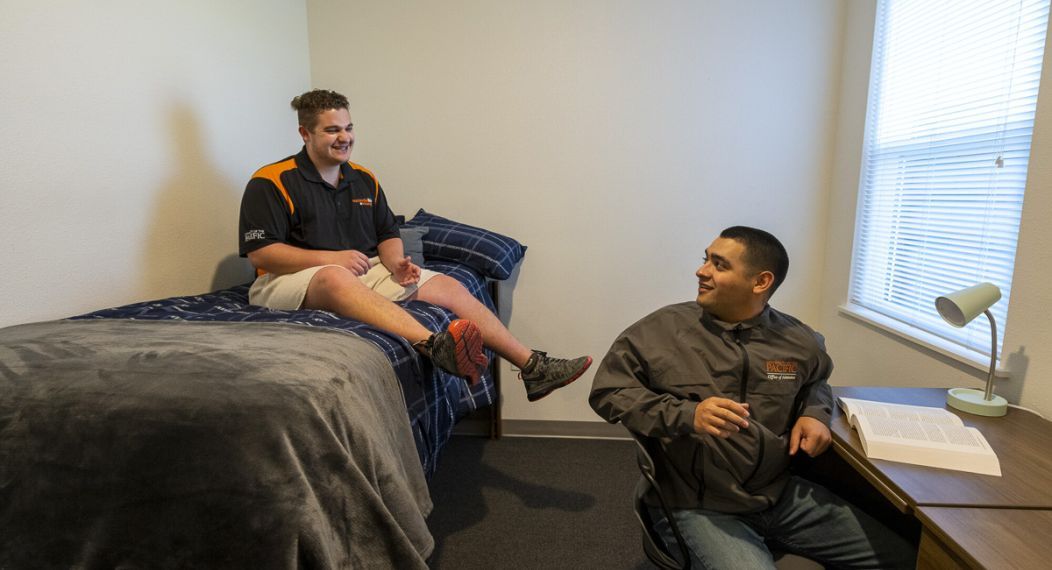 students in dorm room