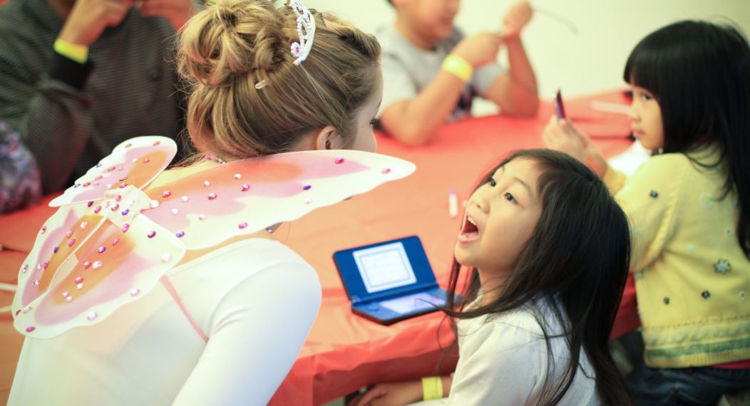 a student working with a young patient