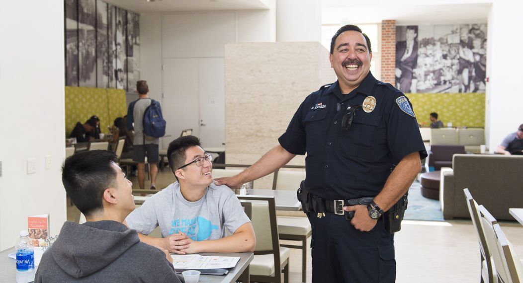 a public safety office talks to students