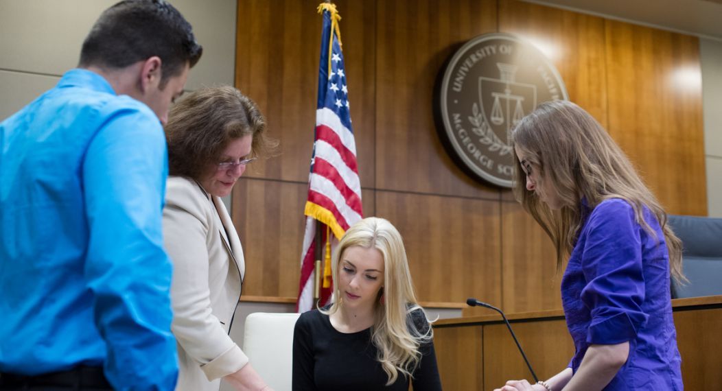 law student and faculty at the courthouse