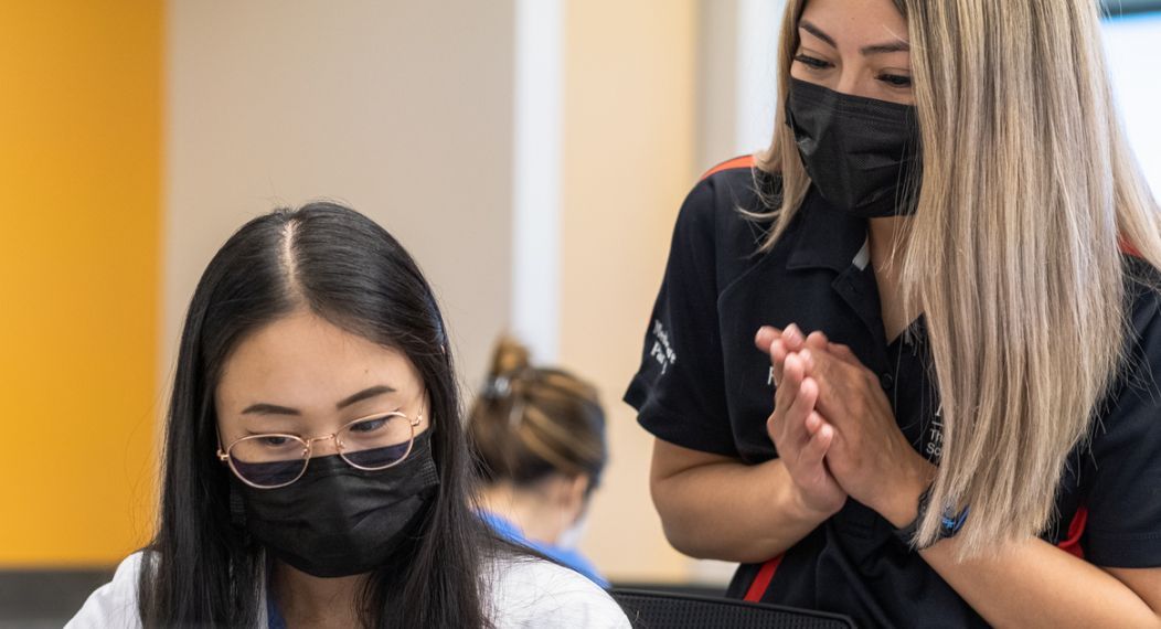 pharmacy students working an experiment