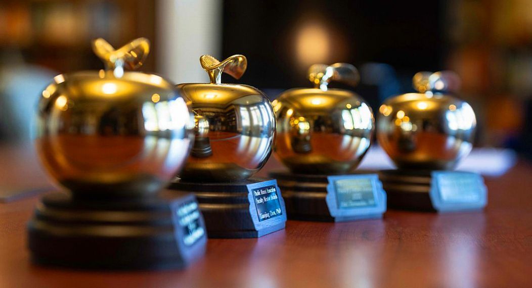 bronze apple-shaped awards