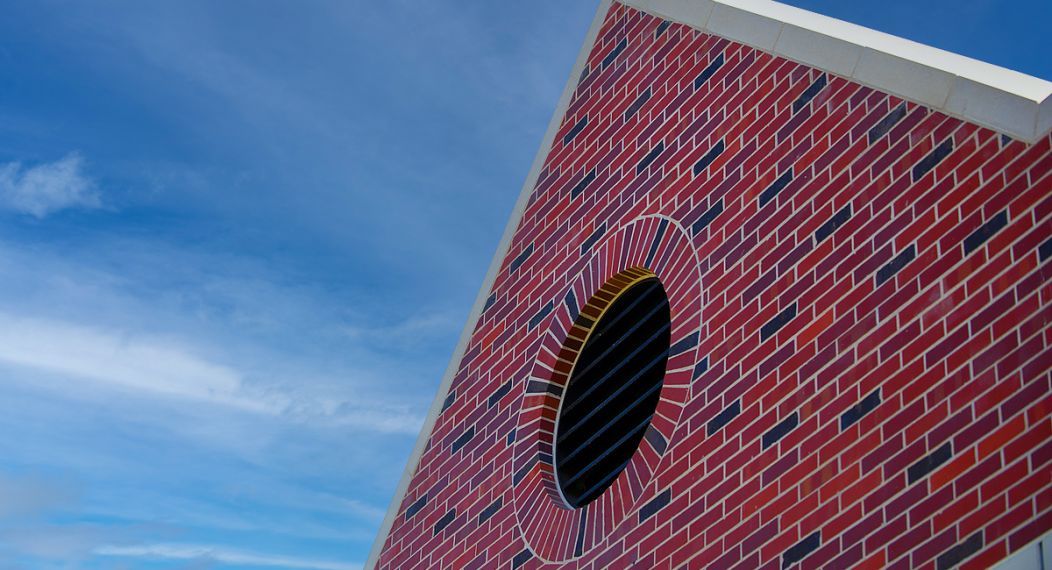 a detail from the alumni house exterior