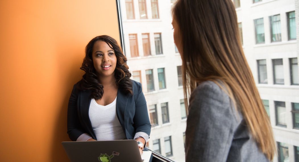 two students in the master of data science program having a conversation