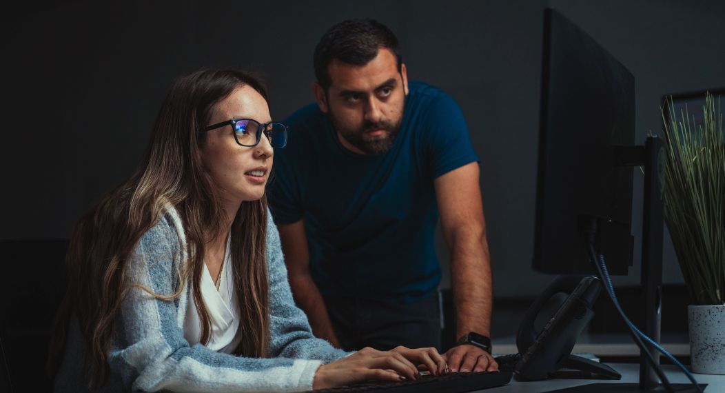 Cybersecurity students collaborate in computer lab