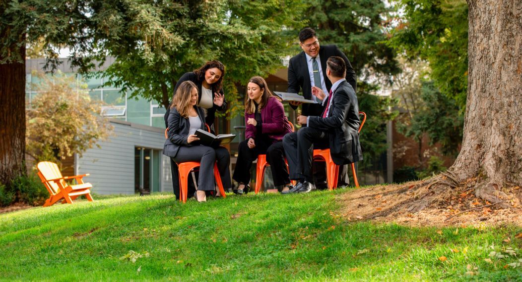 group of students studying on campus