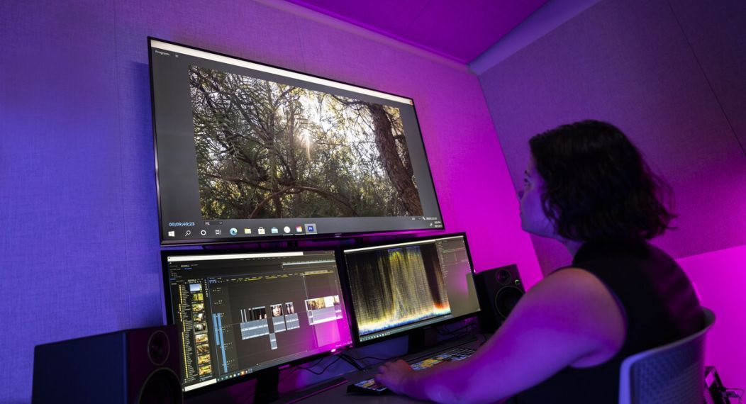 a student edits video 