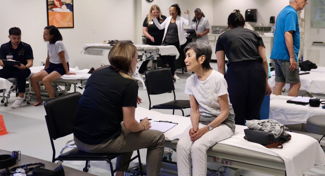 Pacific students practice physical therapy techniques