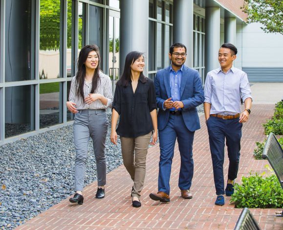 Sachin Shah walks with PharmD students on North Campus