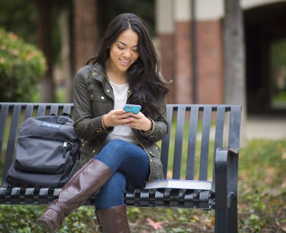 student using mobile phone