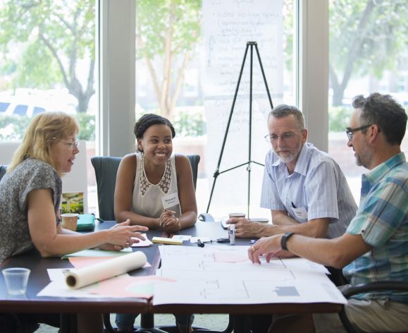 staff meeting in Library