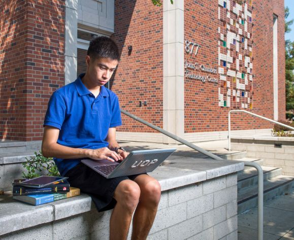 student using laptop