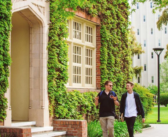 students walking by Knoles hall