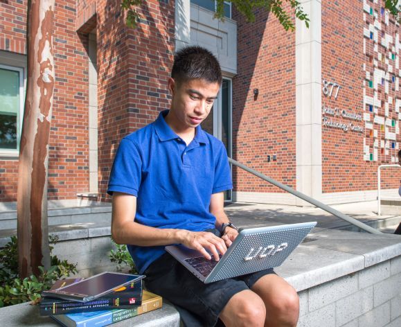 student working on laptop