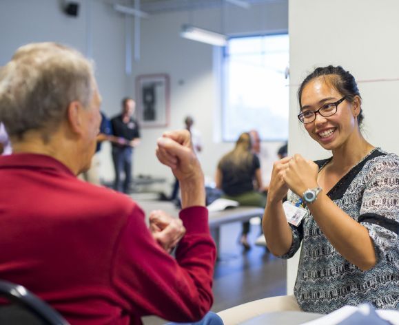 physical therapy student in clinic with patient