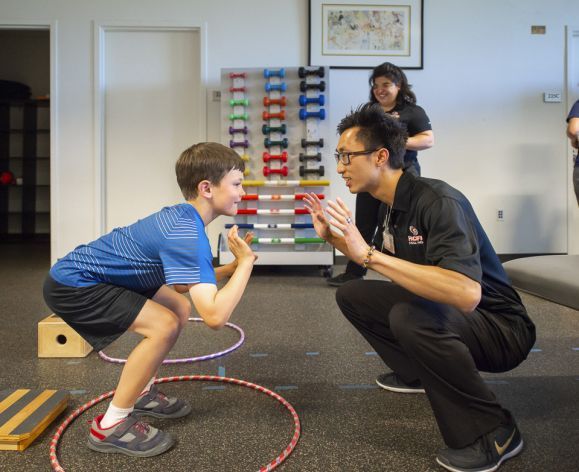 PT student working with child in clinic