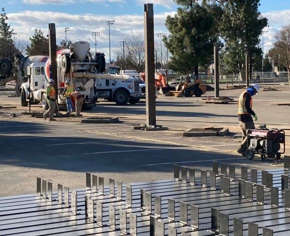 Solar canopy construction underway.